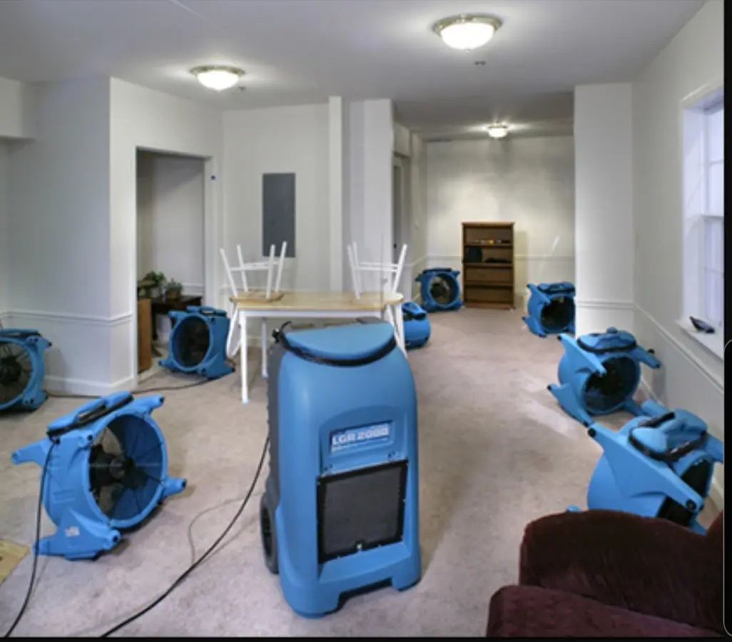 Air movers and dehumidifier setup for Water Extraction & Removal in Brownsville